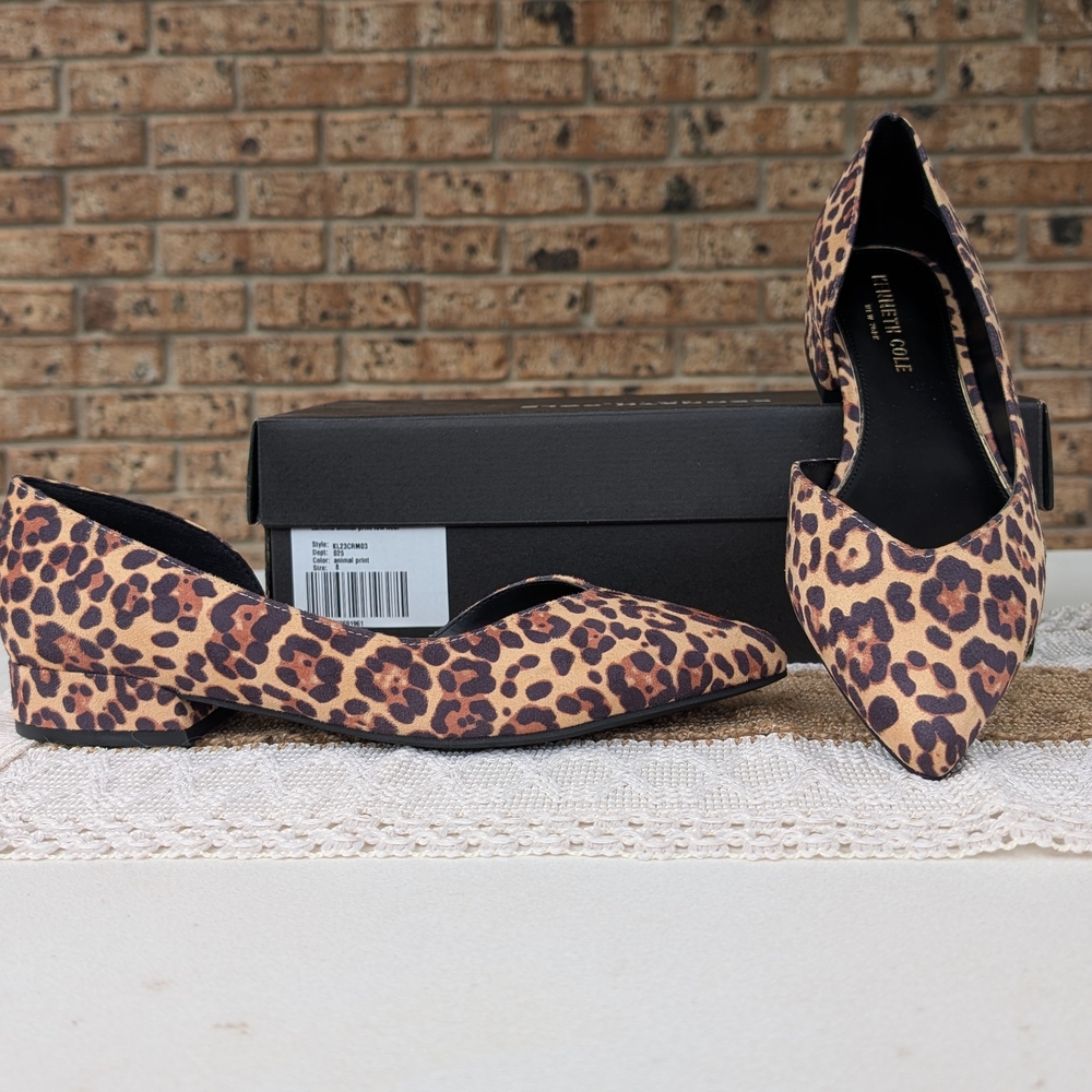 Kenneth Cole Brown and Black Flats Sleek and Versatile
